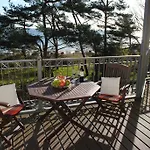 Panorama-Meerblick in der Villa Atlantic mit Strandkorb am Strand